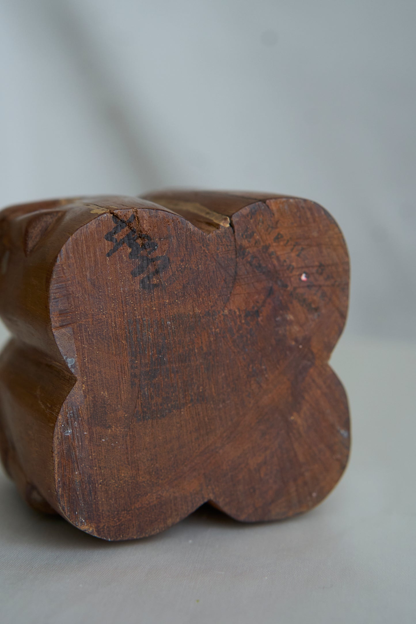 Vintage wood carved mini statue of 4 African faces