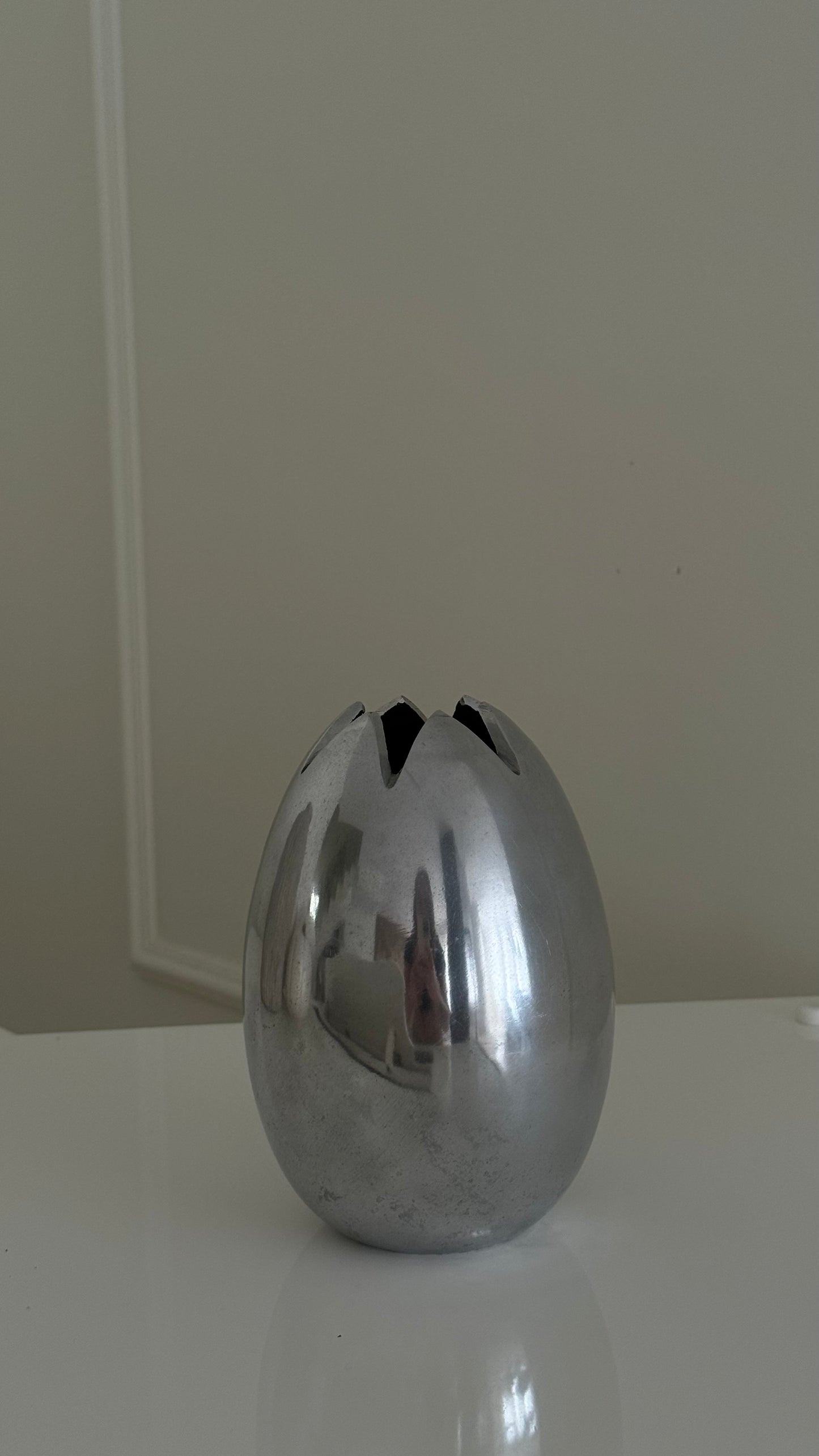 1980s egg shape stainless steel vase