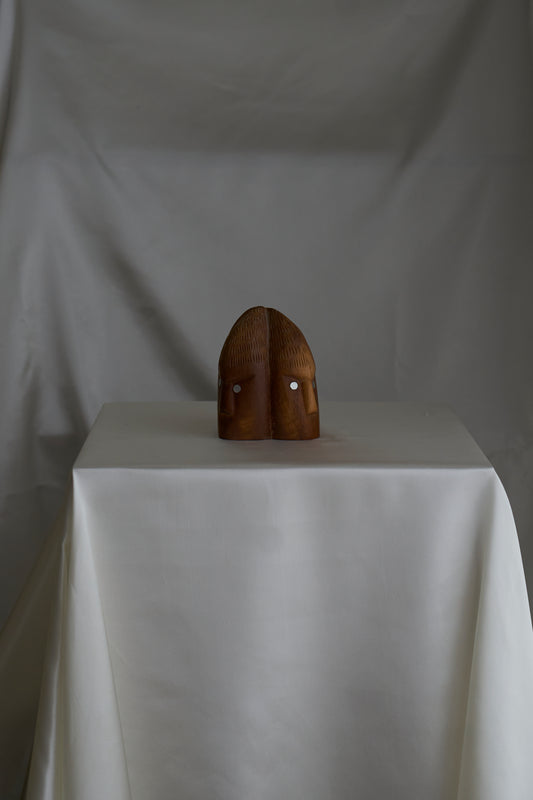 Vintage wood carved mini statue of 4 African faces